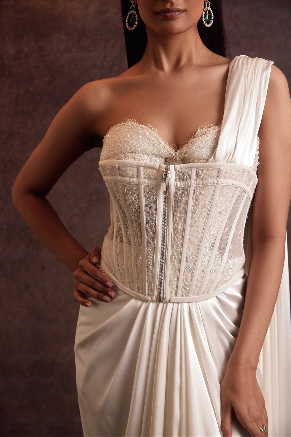 Sohvi Ivory Bustier Blouse With Corset Belt and Drape Slit Saree