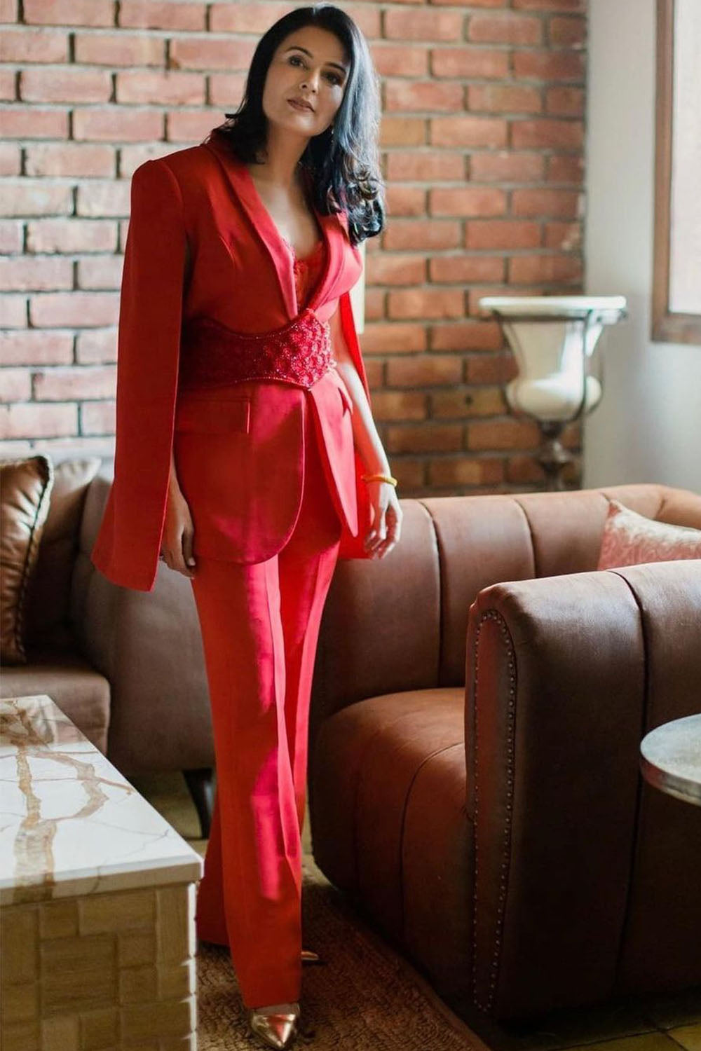 Divya Kapoor In Our Red Cape Blazer Suit